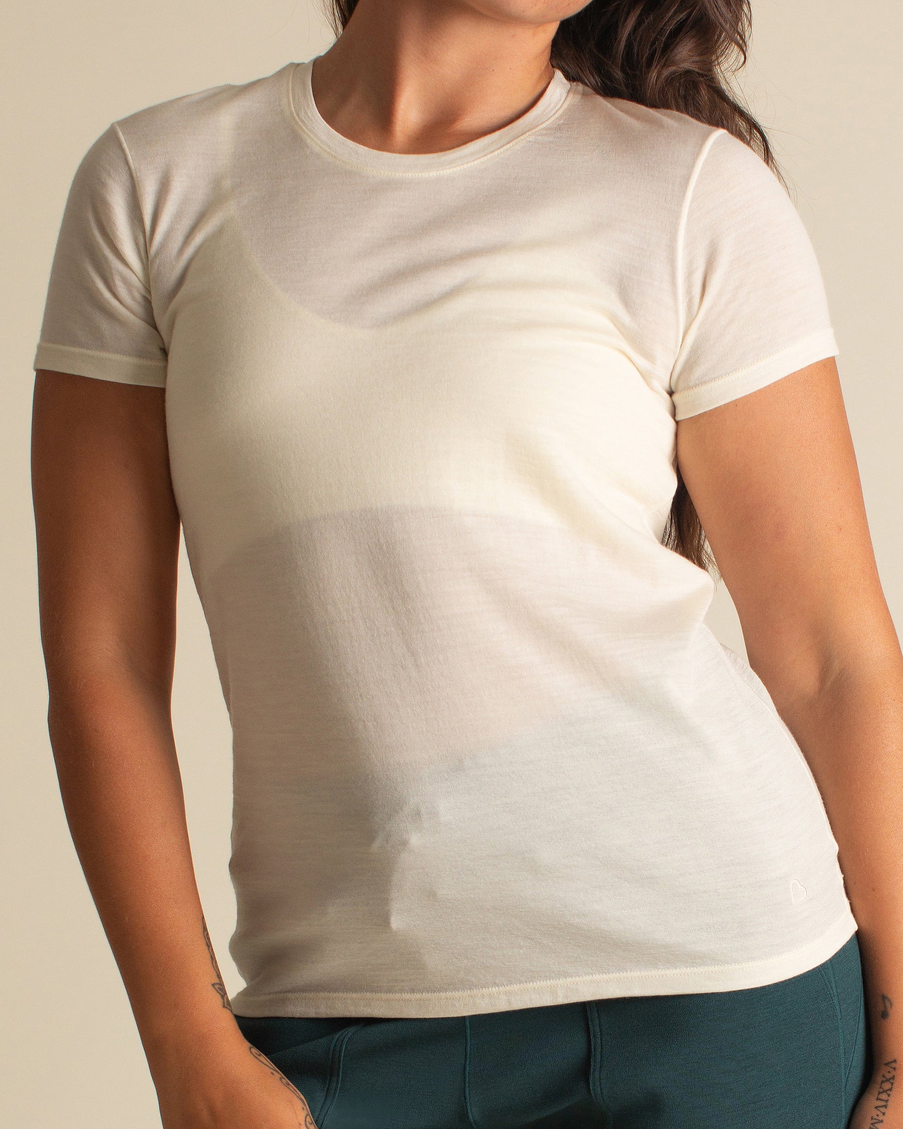 Woman wearing BRANWYN Women's Merino Wool Natural White Short Sleeve Tee