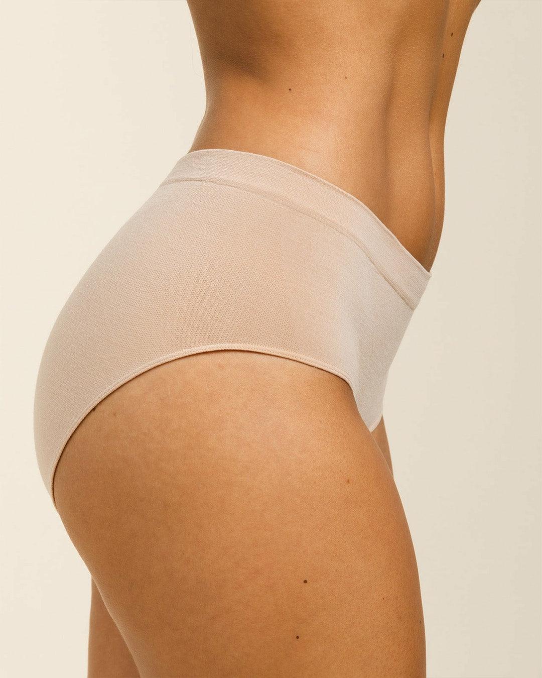 Side view of BRANWYN high waisted Hipster underwear in light nude, beige. Sustainable Merino wool underwear for women, breathable and eco-friendly comfort.