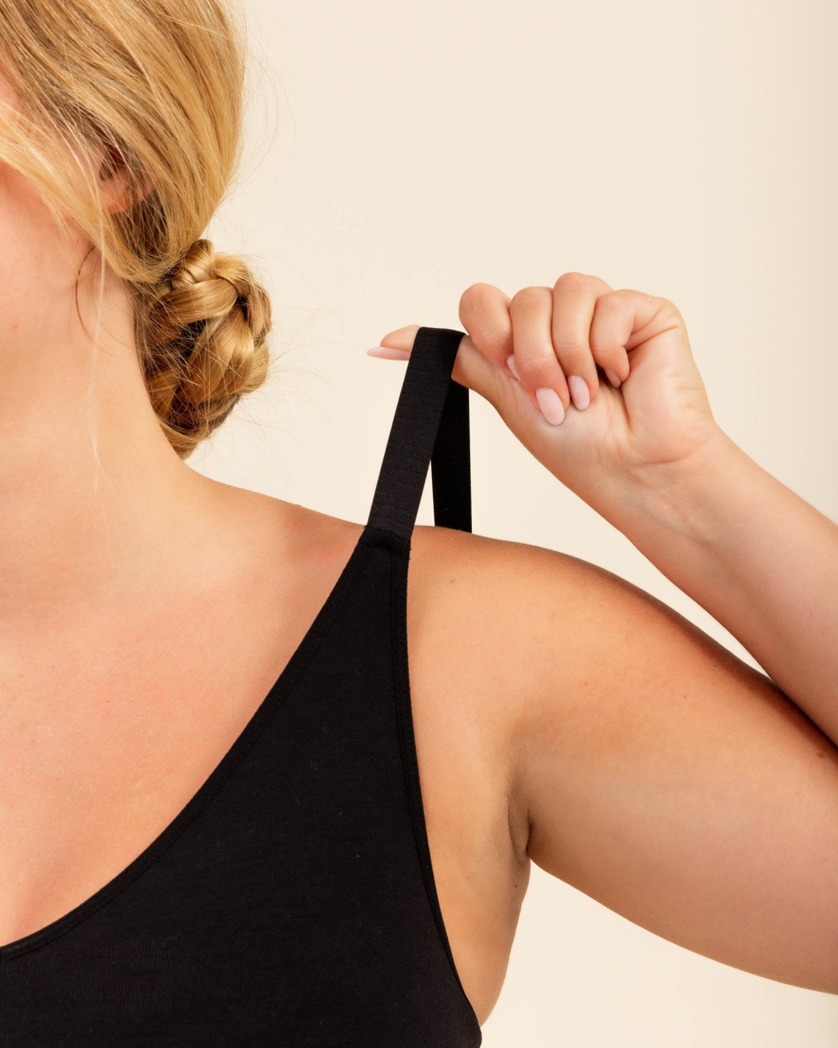 Merino Busty Bra strap detail in black, wireless seamless support for larger busts.