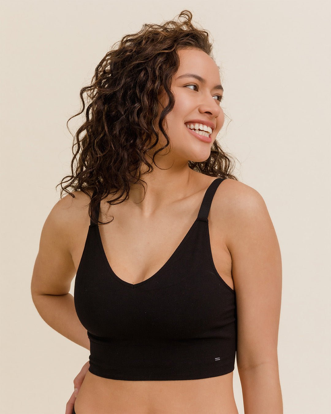 Front view of black Busty Bra, natural merino wool for eco-friendly support.