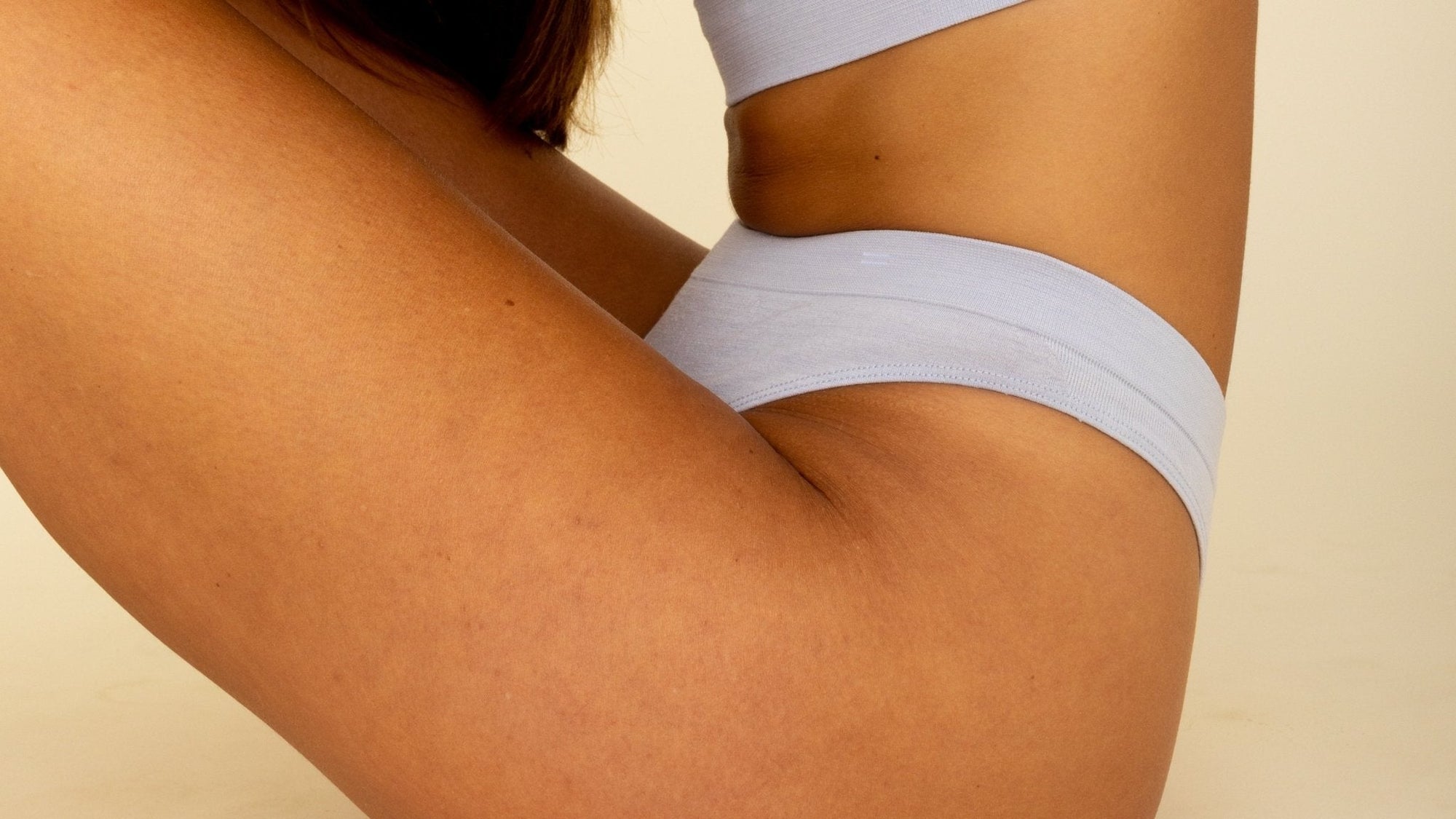 Close up of woman in her underwear illustrating vaginal health tips for women.