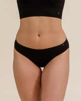 Close up of soft, comfy, seamless Merino underwear in the bikini style by BRANWYN in black.