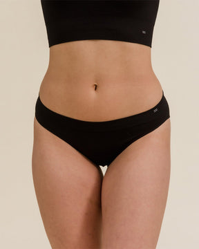 Close up of soft, comfy, seamless Merino underwear in the bikini style by BRANWYN in black.