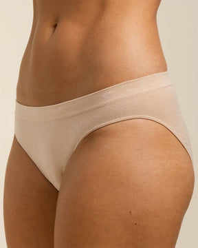 Close up of BRANWYN Essential Bikini underwear in light nude. These Merino panties stay dry with breathable, mositure wicking Merino.