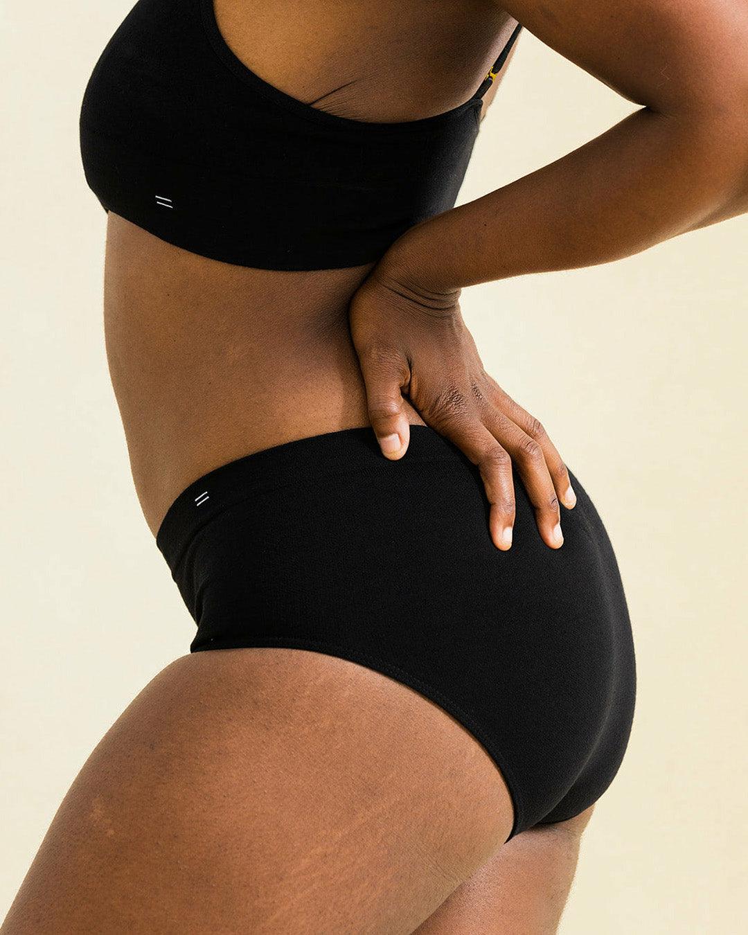 Side view of black high waisted Merino womens underwear, the BRANWYN Essential Hipster. The best underwear for hiking and outdoors.