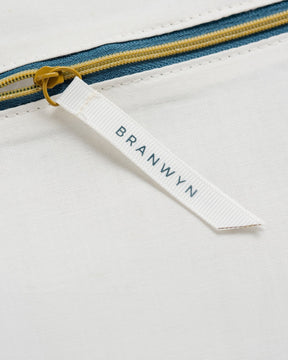 Image shows BRANWYN's Essential Laundry Bag, a GOTS Certified Organic cotton wash bag designed to protect bras and underwear during machine washing. Made from eco-friendly, non-synthetic fabric, it helps prevent snagging, stretching, and damage—prolonging the life of your essentials. Unlike synthetic mesh bags, this organic cotton alternative prevents microplastic pollution, supporting both environmental and social responsibility. A sustainable choice for garment care.