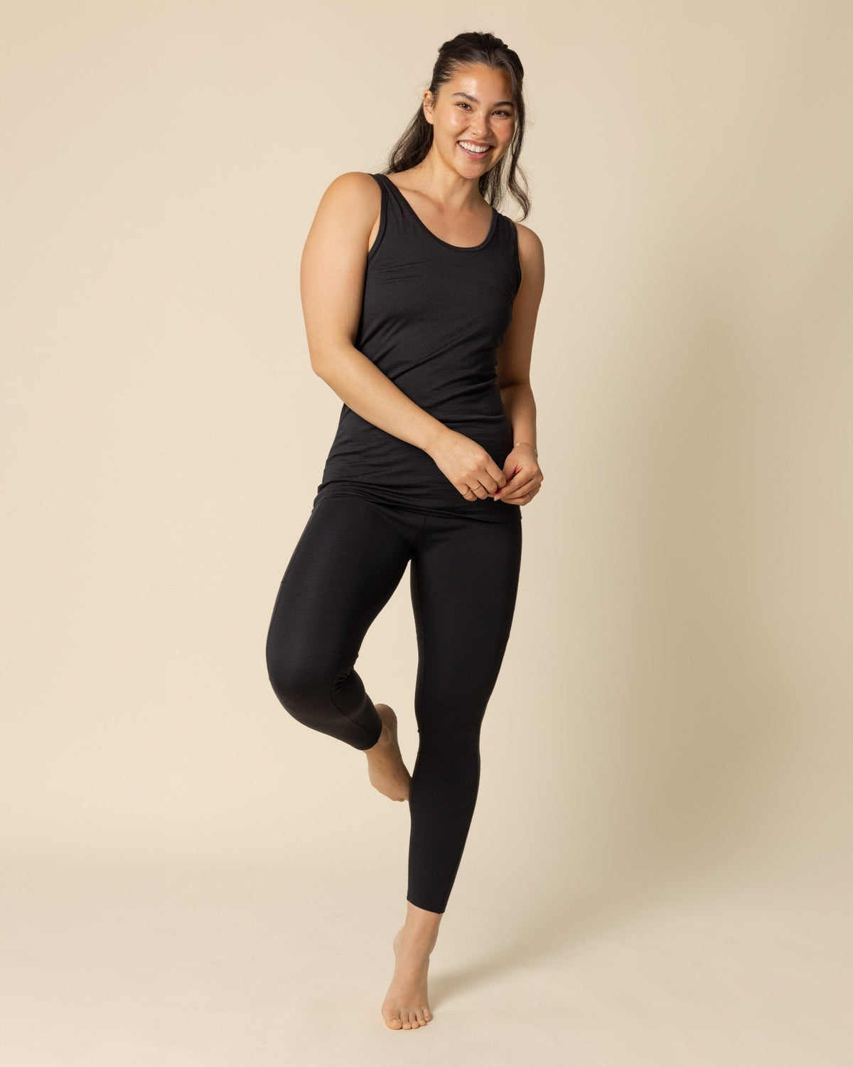 Woman wearing BRANWYN's SWAG 24 | Legging, a piece from the limited-edition SWAG (Sustainable Wool Athleisure Gear) Collection. Made from ethically sourced, ultra-fine Merino wool, this piece is buttery soft, breathable, and designed for both performance and everyday wear.