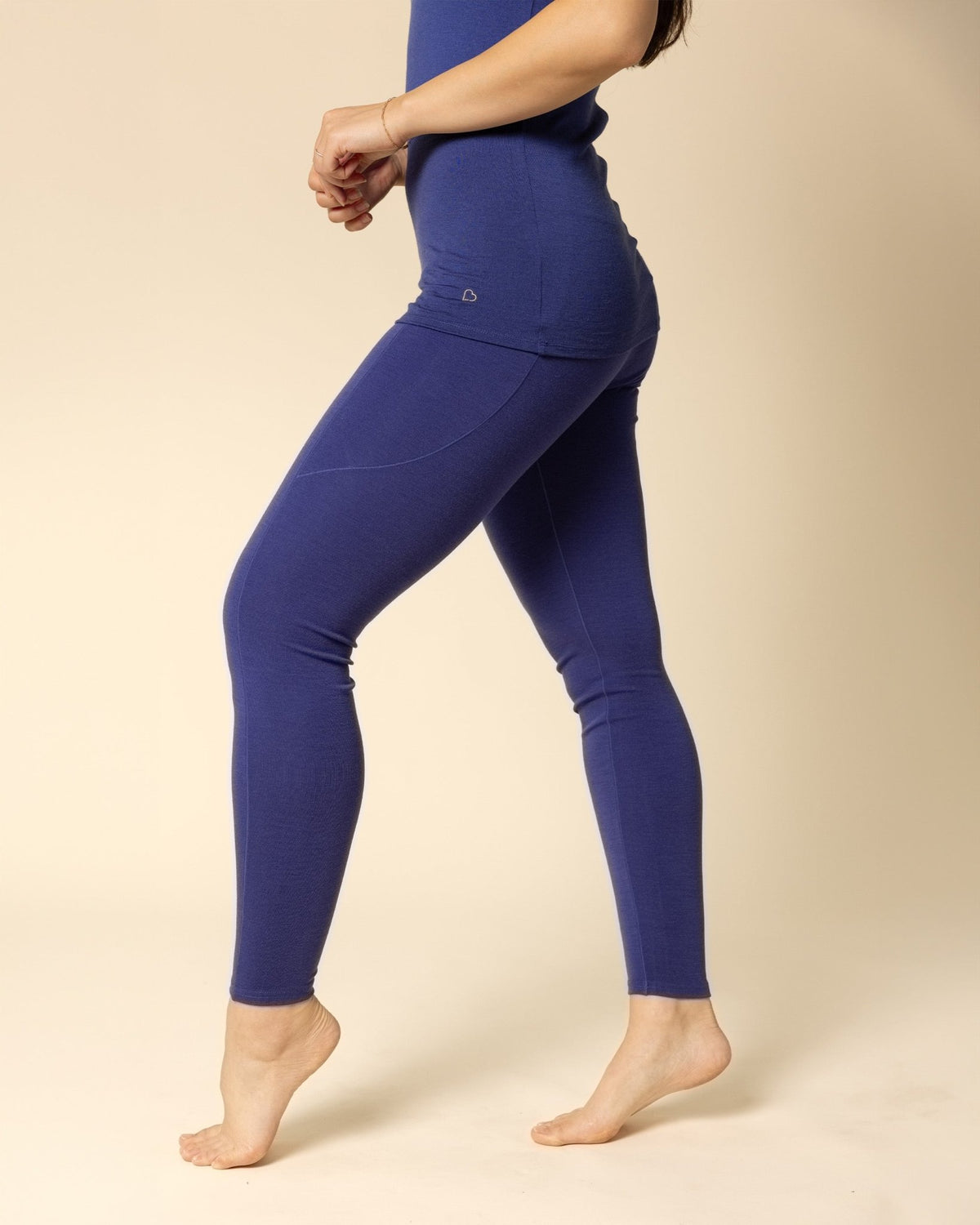 Woman wearing BRANWYN's SWAG 24 | Legging, a piece from the limited-edition SWAG (Sustainable Wool Athleisure Gear) Collection. Made from ethically sourced, ultra-fine Merino wool, this piece is buttery soft, breathable, and designed for both performance and everyday wear.