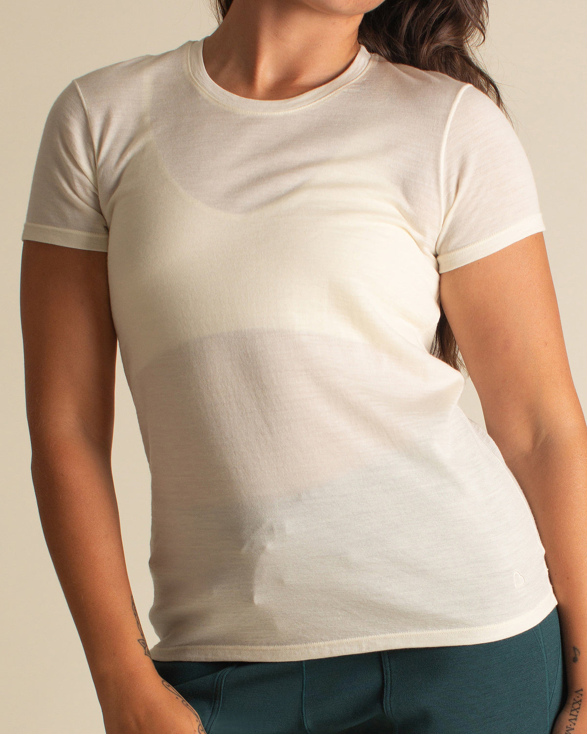 Woman wearing BRANWYN Women's Merino Wool Natural White Short Sleeve Tee 