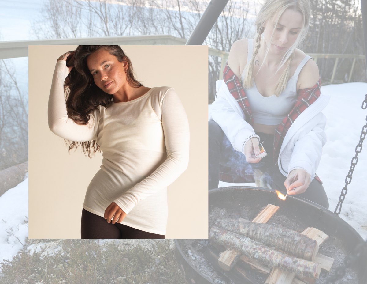 Woman wearing a white long-sleeve Merino baselayer in a snowy outdoor setting.