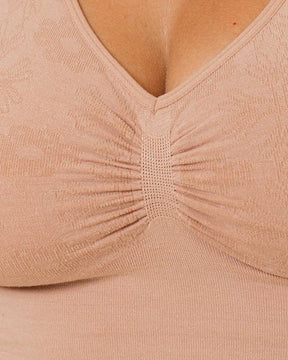 Detail view of  center ruching on the BRANWYN Supreme Bra, a supportive Merino wool bralette.