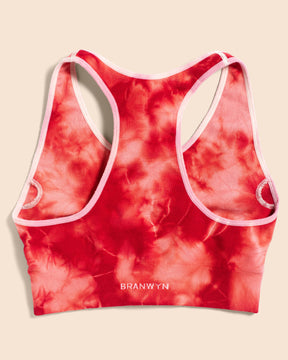 Back View of the BRANWYN Merino Wool Tie Dye Essential Racerback Sports Bra Coral
