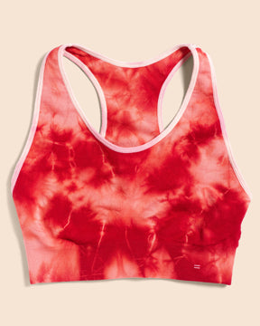 Front View of the BRANWYN Merino Wool Tie Dye Essential Racerback Sports Bra Coral